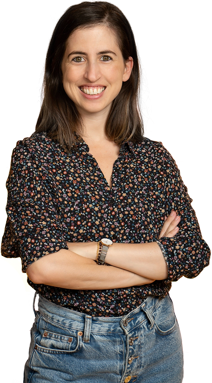 An educational consultant specialized in underachievers standing and smiling